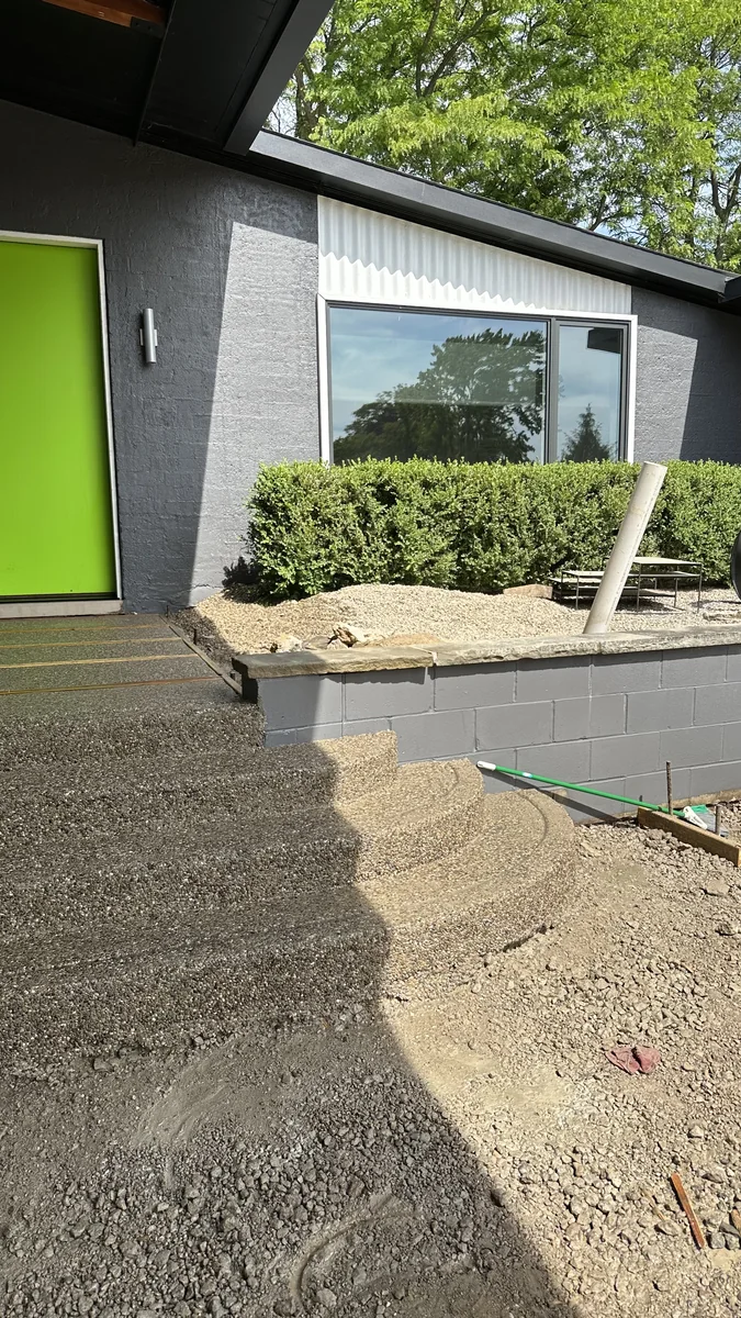 Finished concrete walkway and entry project by A&M Works