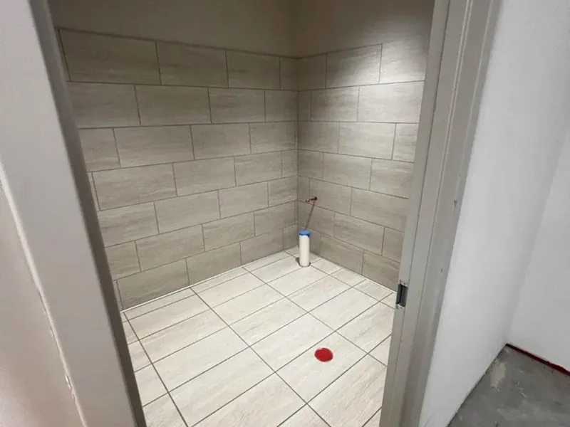 Shower tile surround by A&M Works